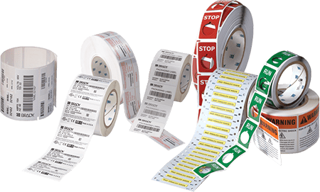 A variety of Brady custom labels in different sizes, colors, and configurations.