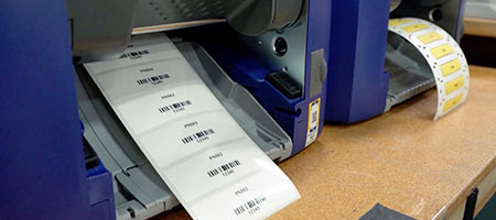 Labels printing automatically.