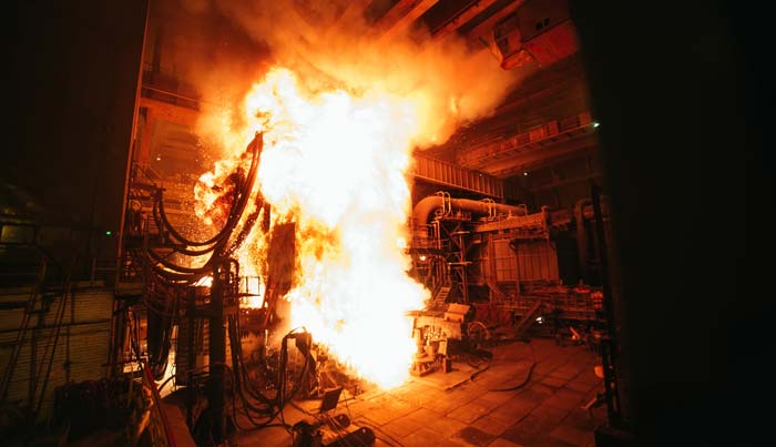 A destructive explosion caused by an arc flash.