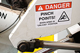 Machine equipment pinch point safety label.