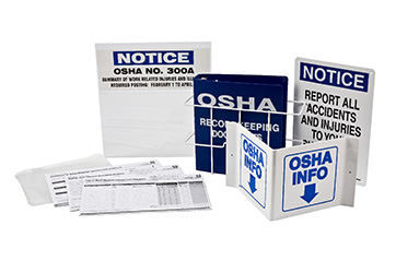 Binders and manuals with OSHA resources.