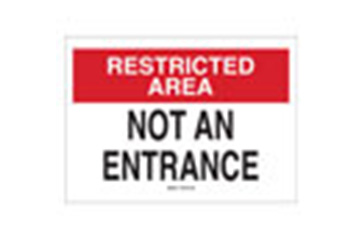 A sign that says "RESTRICTED AREA NOT AN ENTRANCE."