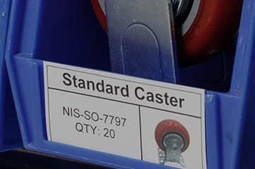 A bin for holding casters with a visual label identifying the contents with text and a picture of the caster.